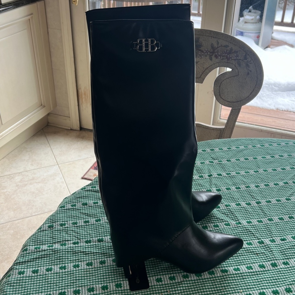NWT Bebe Black Heeled Boots with Logo Detail. Unique with covered heel. Size 8.